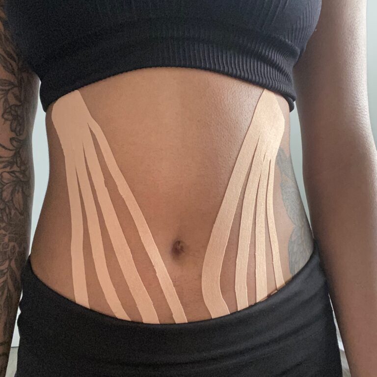 A woman with white strips on her stomach.
