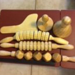A wooden board with many different shapes and sizes of dough.